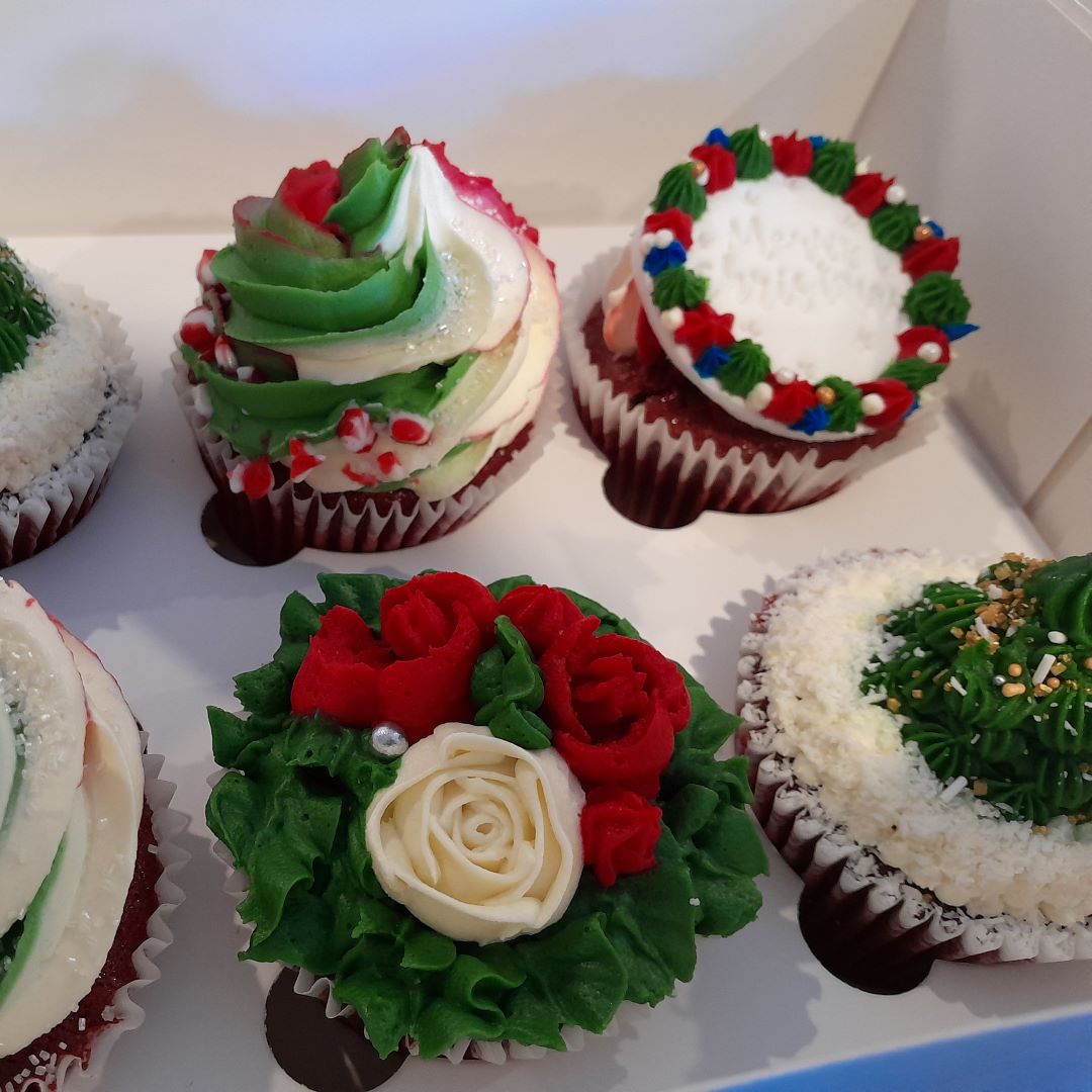 Red velvet cupcakes with Christmas decorations
